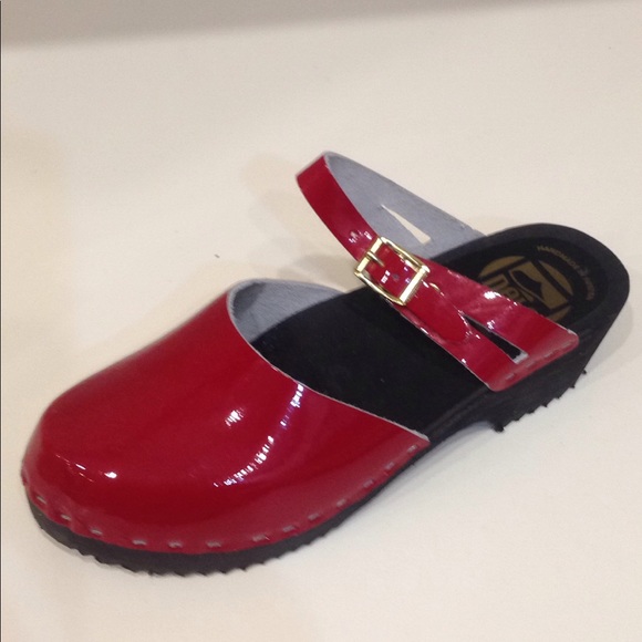red patent leather clogs